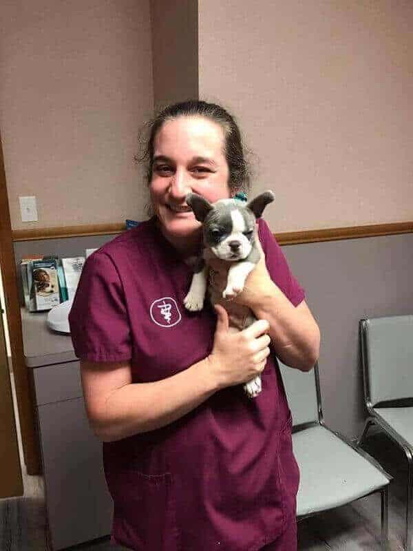 Carrie with a small puppy